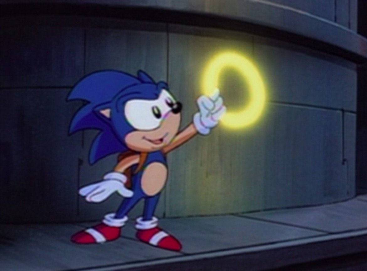 Sonic reaches for a ring in the Sonic the Hedgehog animated series