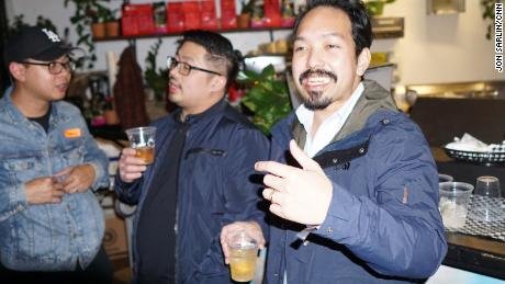 Alfonso Maputol, right, flew in from Singapore for the event.