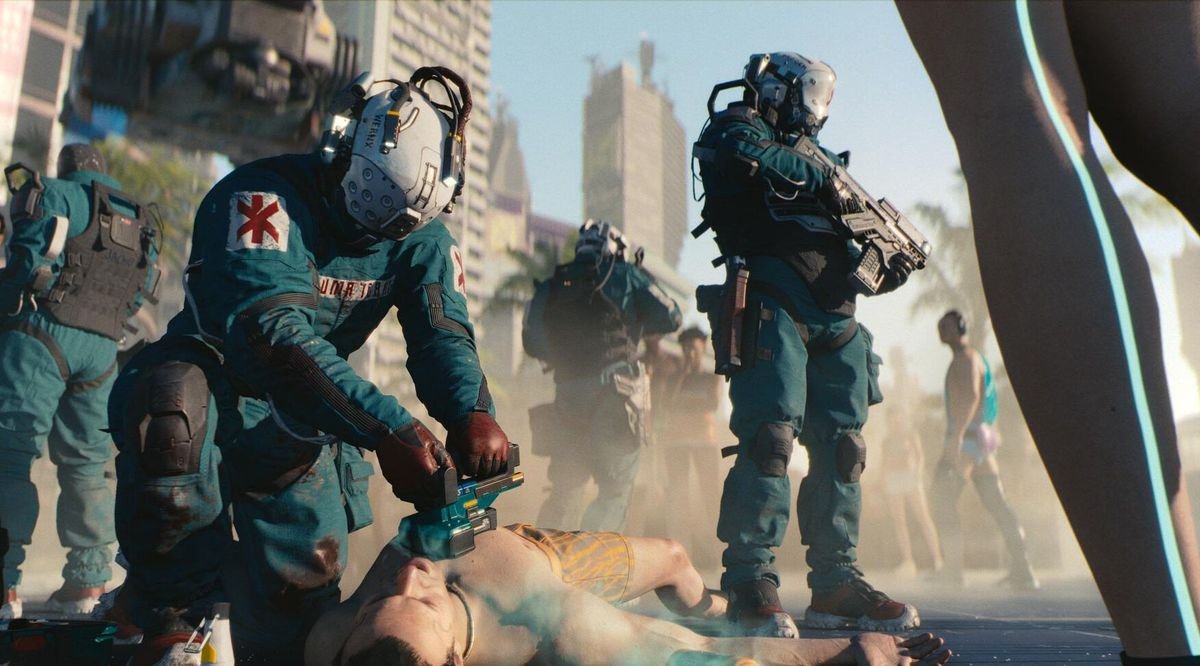 A trauma team treats a patient in Cyberpunk 2077
