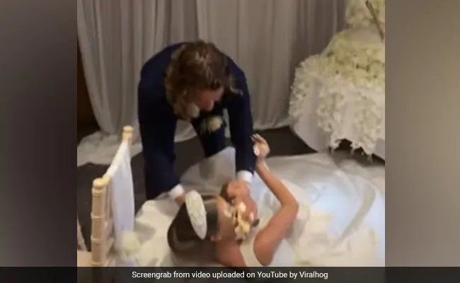 Une vidéo virale montre un marié brisant un gâteau de mariage sur le visage de la mariée, Internet l’appelle « Spoiler »