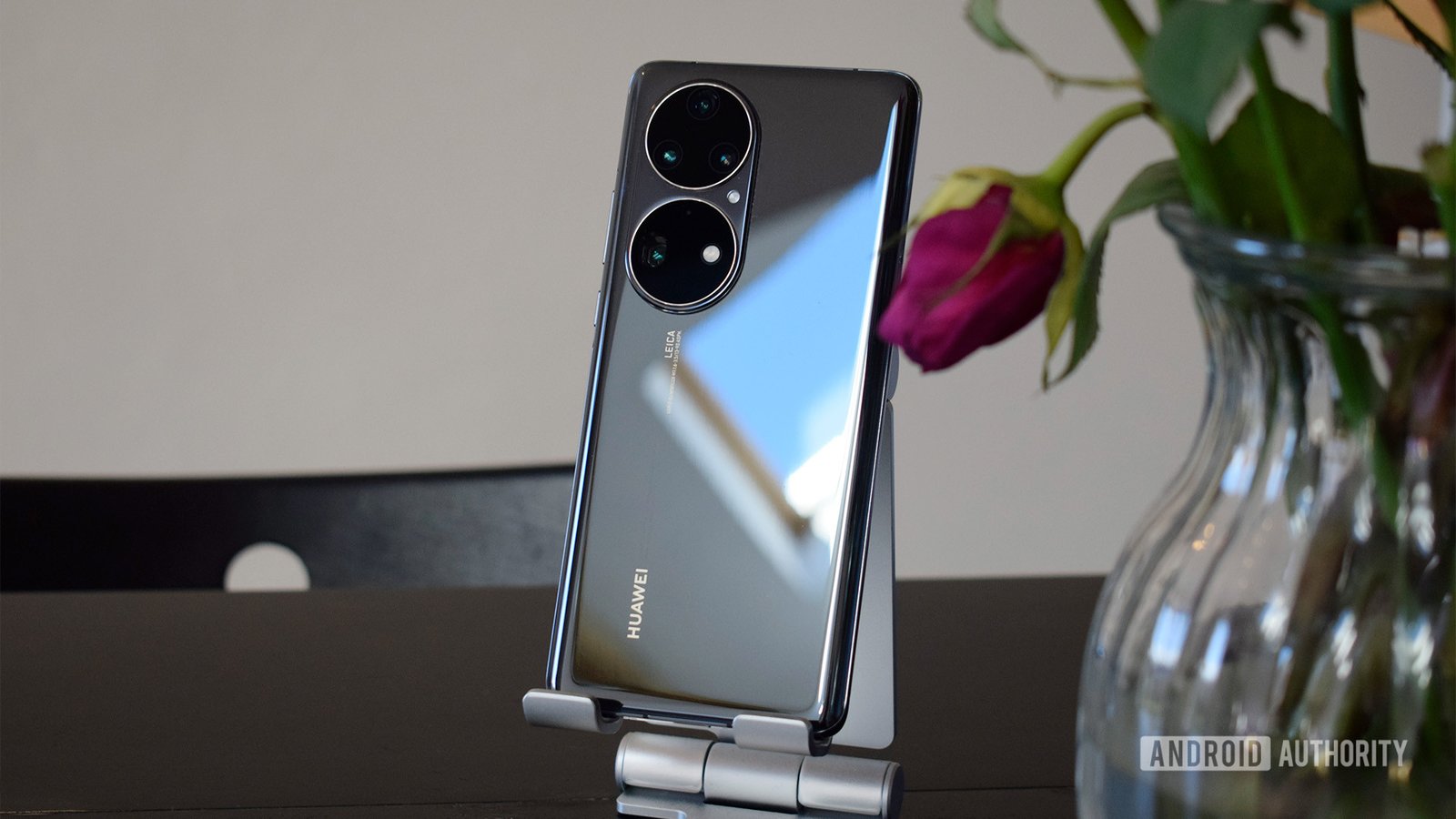Huawei P50 Pro in stand hero 2 Huawei P50 Pro in stand next to rose
