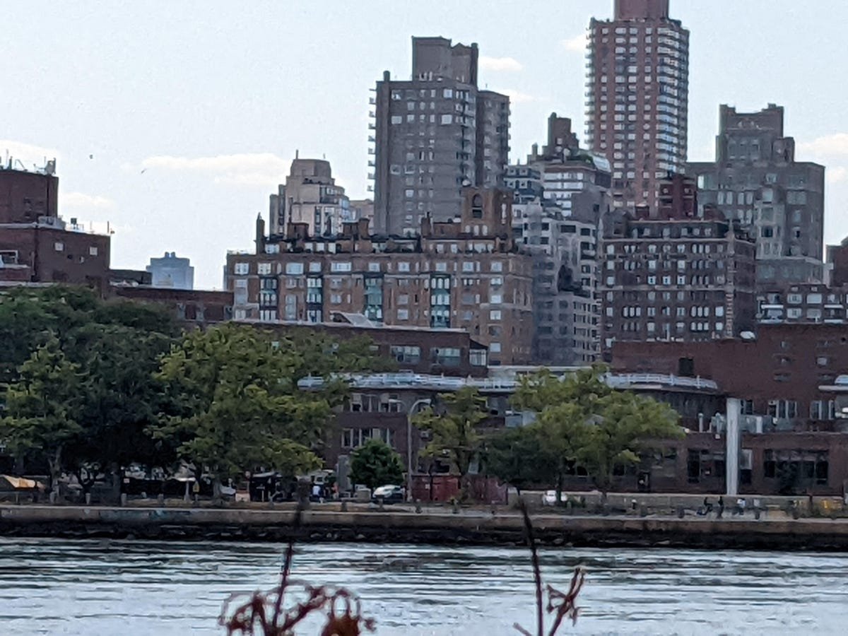 Google Pixel 6A Review: The Best Android Phone Under $500 17 A zoomed-in photo of buildings behind a river taken with the Pixel 6A