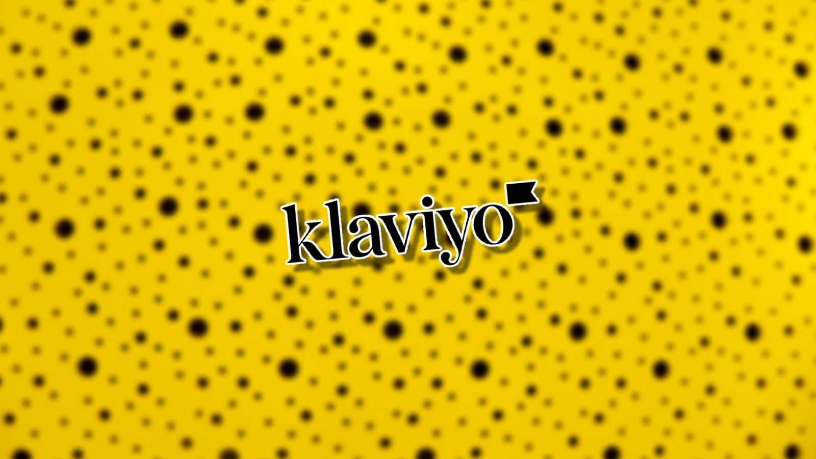 Logo Klaviyo sur fond jaune à pois