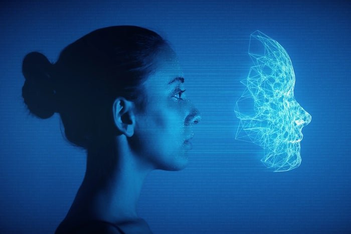 Le visage d'une personne est scanné numériquement.