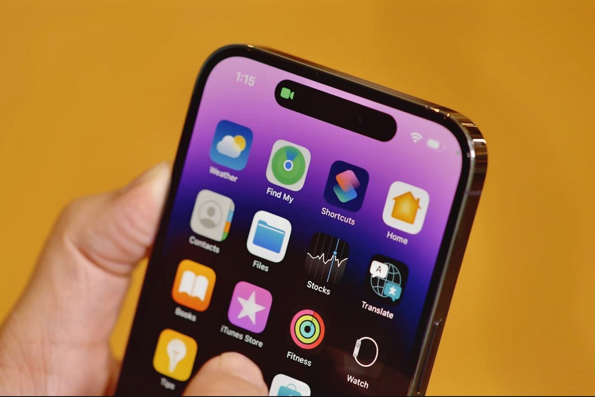 iPhone 14 Pro and 14 Pro Max Review: Welcome to Apple's Dynamic Island 1 An iPhone 14 Pro with a camera indicator in the Dynamic Island