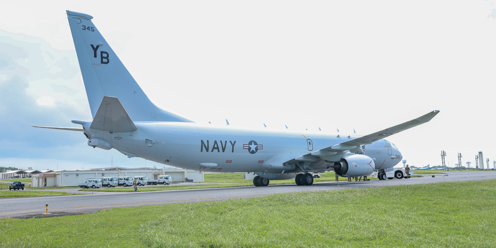 A photo of a plane on a runway.