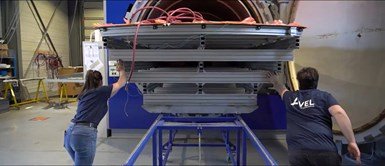 Avel Robotics loading CFRP layups into autoclave