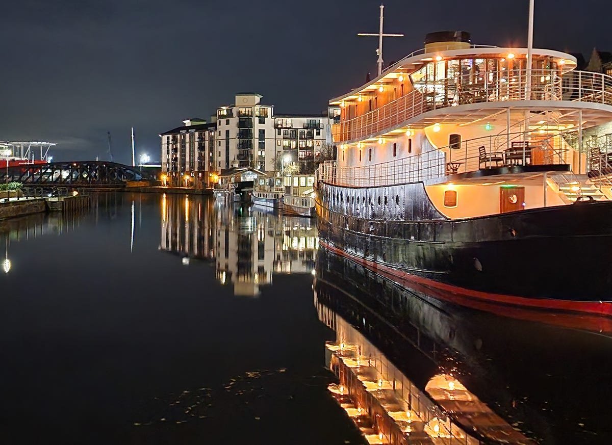 iPhone 14 Pro vs. Pixel 7 Pro, Galaxy S22 Ultra: The Night Mode Test 6 A boat at night zoomed in