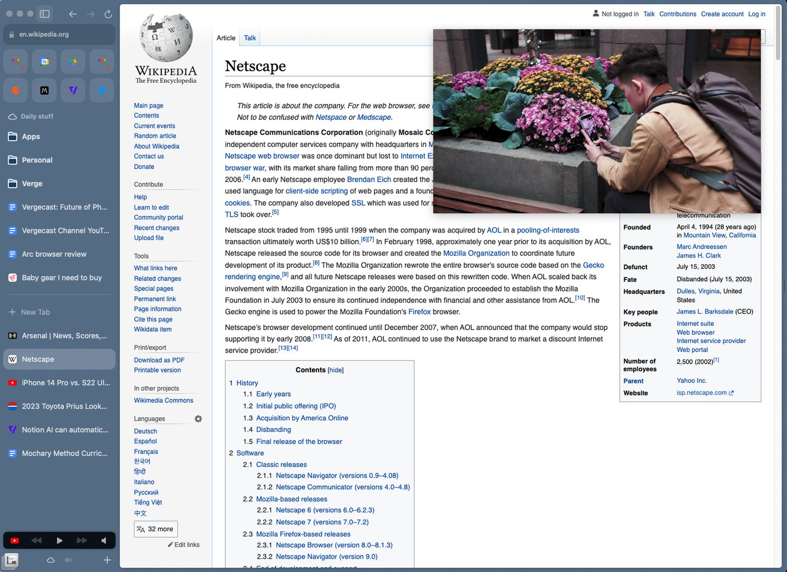 A screenshot of Arc with a Wikipedia page and a video overlaid.