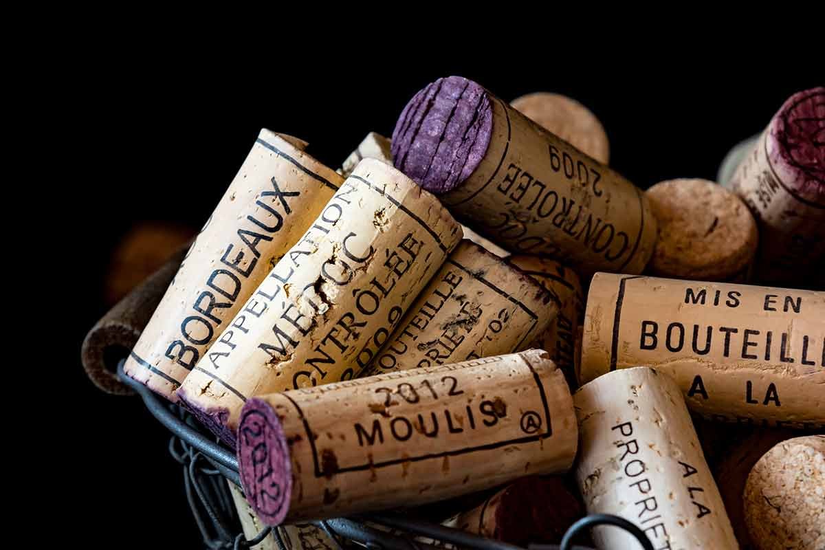 images of paris in winter Old cork stoppers of French wines in a wire basket.