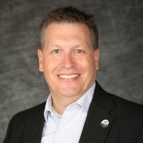 A headshot of Kevin Bommer, executive director of the Colorado Municipal League.