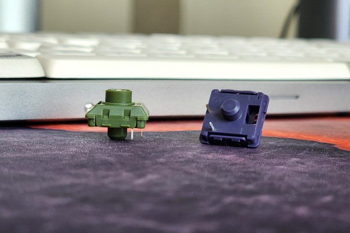 Lofree Flow Kailh Phantom tactile and Ghost linear low profile mechanical keyboard switches on a desk.