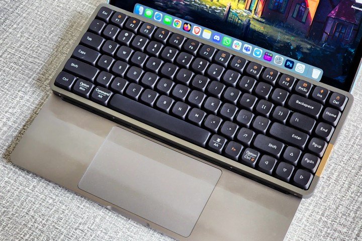 Lofree Flow review: This low-profile keyboard changed me | Digital Trends 6 Lofree Flow low-profile mechanical keyboard on a 13-inch Apple MacBook Pro.
