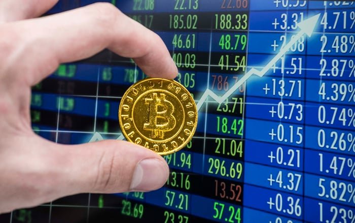 Pièce d'or avec symbole Bitcoin.