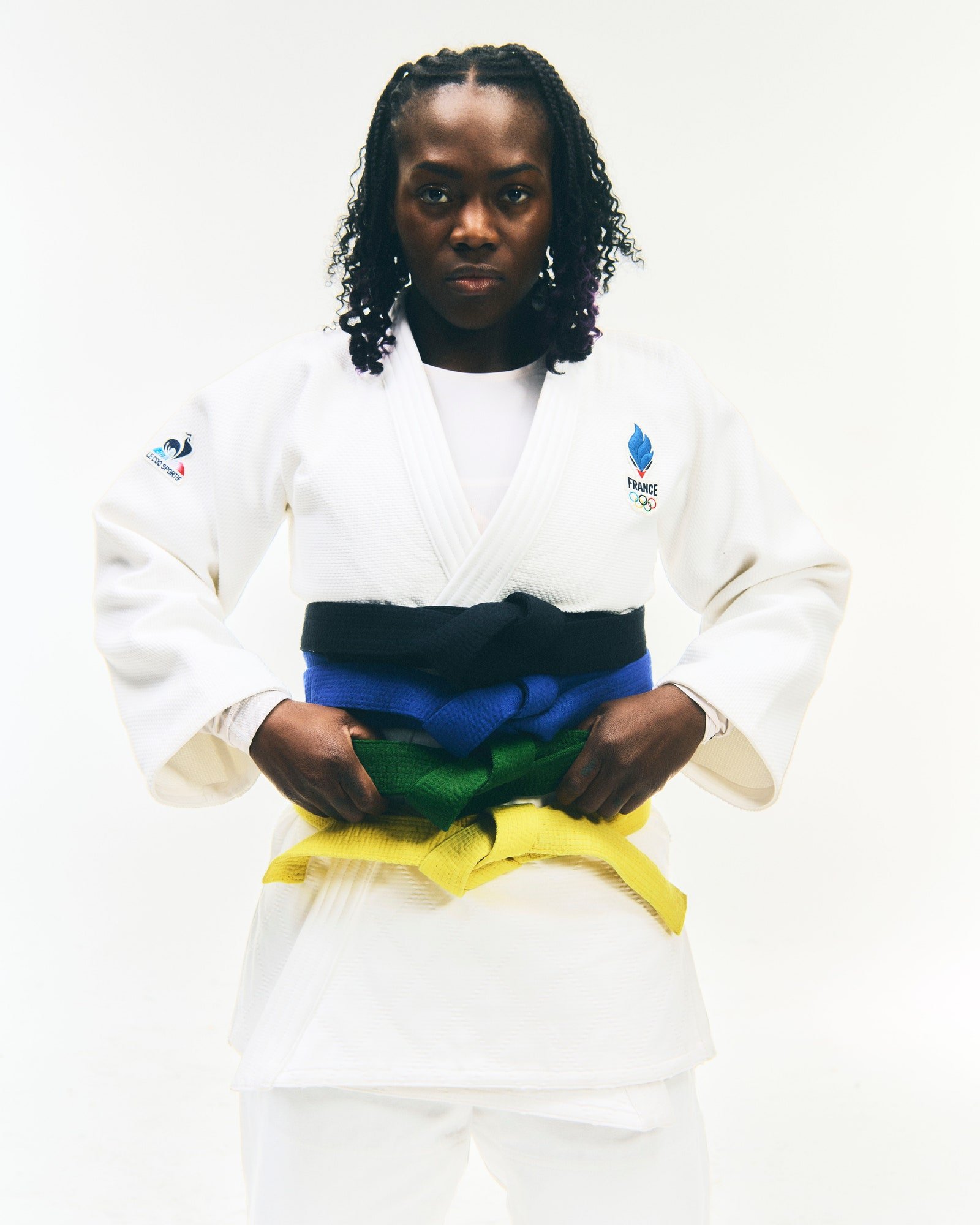 L'image contient peut-être Clarisse Agbegnenou Personne adulte Judo Arts martiaux Sport Visage Tête Photographie et portrait