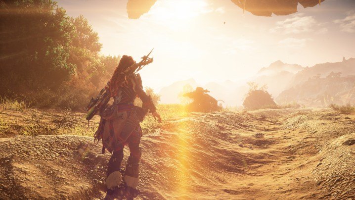Aloy sortant d'une grotte dans Horizon Forbidden West.