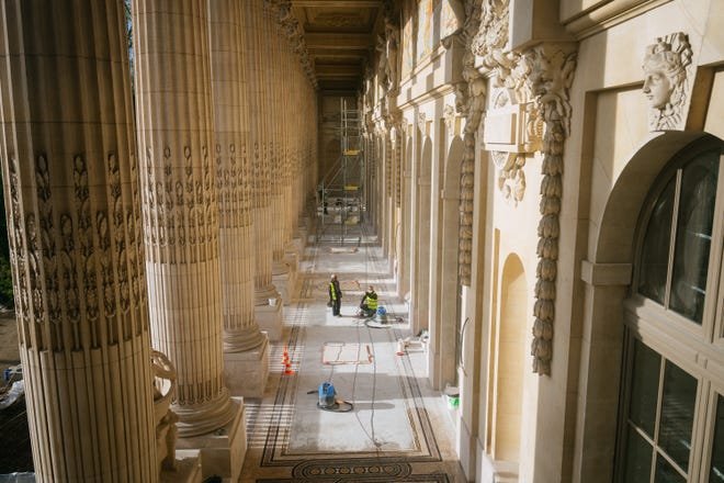 Construction work is done at Le Grand Palais in Paris on April 12, 2024, which will host the fencing and taekwondo competition events during the 2024 Paris Olympic Games.