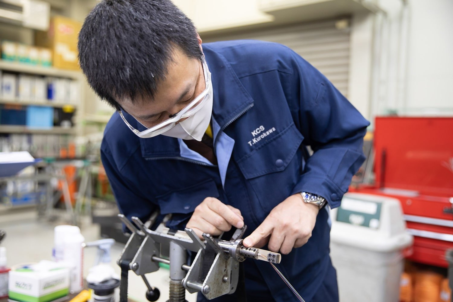 Takashi Kurokawa preparing to splice a fiber.