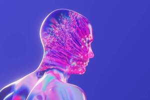Image générée numériquement de sphères de néon multicolores et de remorque de ligne à l'intérieur d'une tête humaine en verre. Concept d'intelligence artificielle.