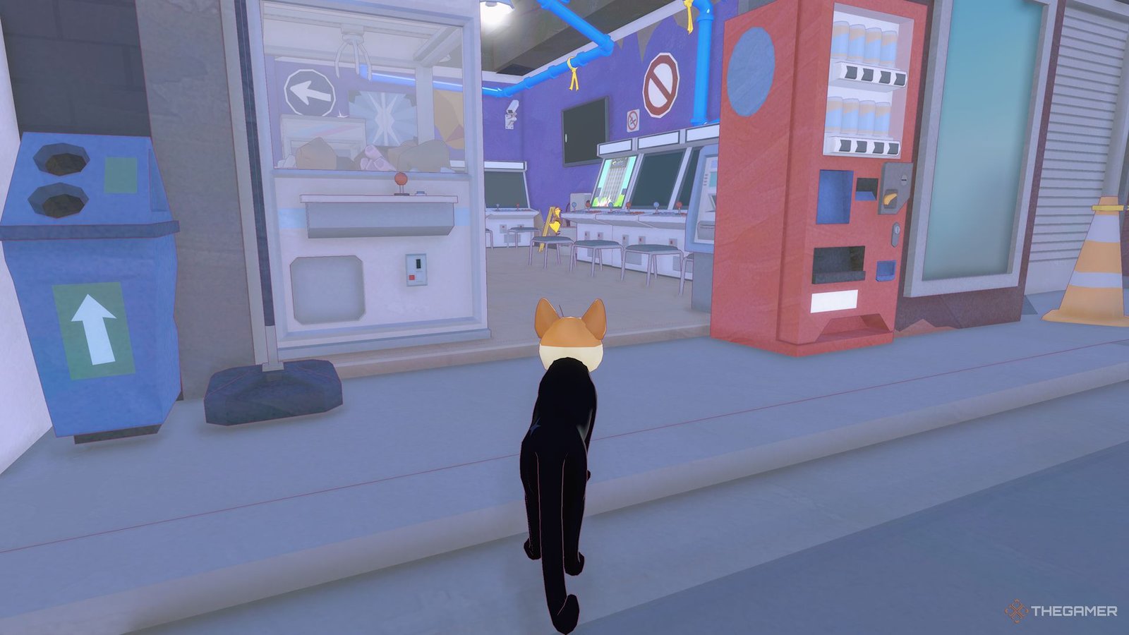 Debout à la porte de la salle de jeux vidéo, je regarde le canard sur un tabouret qui regarde le jeu vidéo de Little Kitty, Big City.